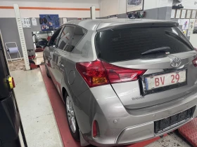 Обява за продажба на Toyota Auris 1, 6i-132к.с/АВТОМАТИК/КАМЕРА/НАВИГАЦИЯ/ТОП !!! ~18 888 лв. - изображение 2 | Auto.bg Обява за продажба на Toyota Auris 1, 6i-132к.с/АВТОМАТИК/КАМЕРА/НАВИГАЦИЯ/ТОП !!! ~18 888 лв. - изображение 2