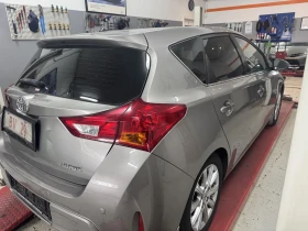 Обява за продажба на Toyota Auris 1, 6i-132к.с/АВТОМАТИК/КАМЕРА/НАВИГАЦИЯ/ТОП !!! ~18 888 лв. - изображение 3 | Auto.bg Обява за продажба на Toyota Auris 1, 6i-132к.с/АВТОМАТИК/КАМЕРА/НАВИГАЦИЯ/ТОП !!! ~18 888 лв. - изображение 3
