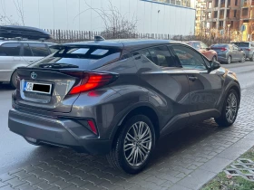 Toyota C-HR 1.8 Hybrid E-CVT Lounge Facelift - в ГАРАНЦИЯ, снимка 3