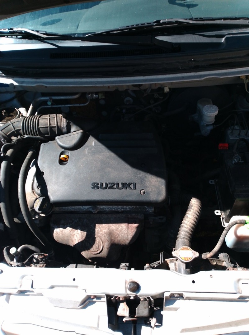 Suzuki Liana, снимка 9 - Автомобили и джипове - 45958209