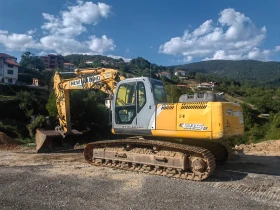      New Holland E215B