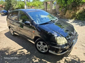  Nissan Almera tino