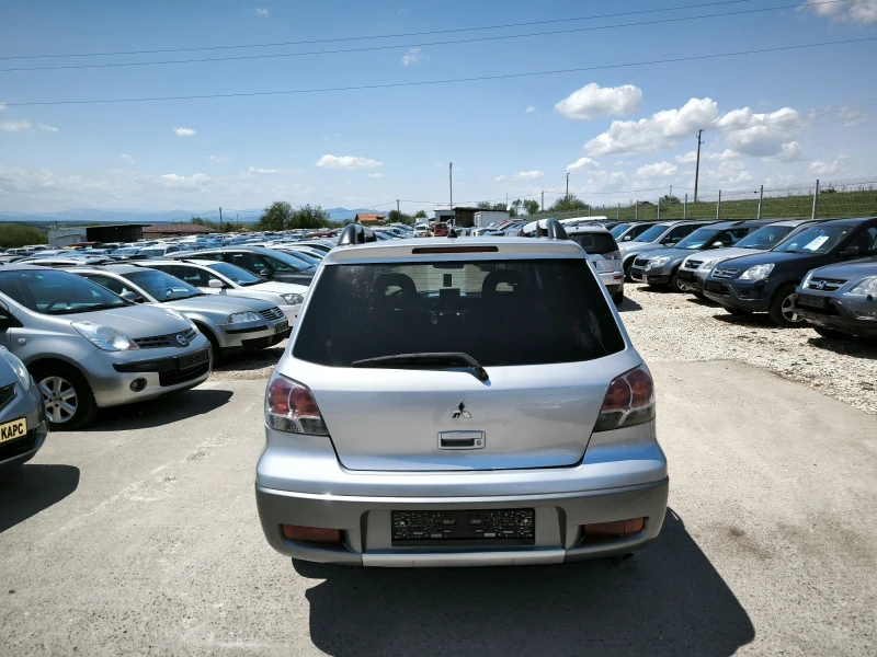 Mitsubishi Outlander 2.4i 4x4, снимка 6 - Автомобили и джипове - 50366067