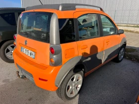Обява за продажба на Fiat Panda 1.3d Mjet 4x4 Cross PANORAMA ~4 499 лв. - изображение 11 | Auto.bg Обява за продажба на Fiat Panda 1.3d Mjet 4x4 Cross PANORAMA ~4 499 лв. - изображение 11