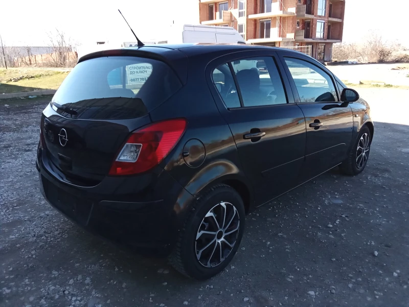 Opel Corsa 1.2i-80kc., снимка 8 - Автомобили и джипове - 49405674