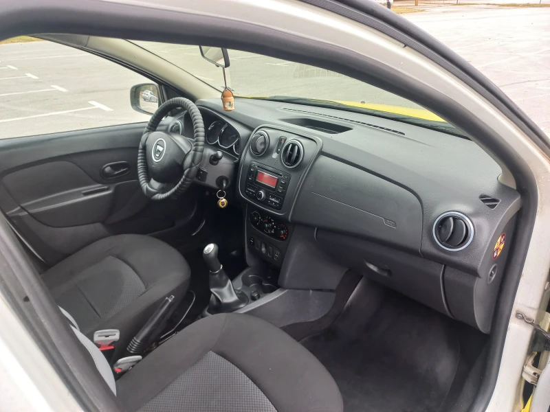 Dacia Logan 1.5dci климатик, снимка 13 - Автомобили и джипове - 51411638