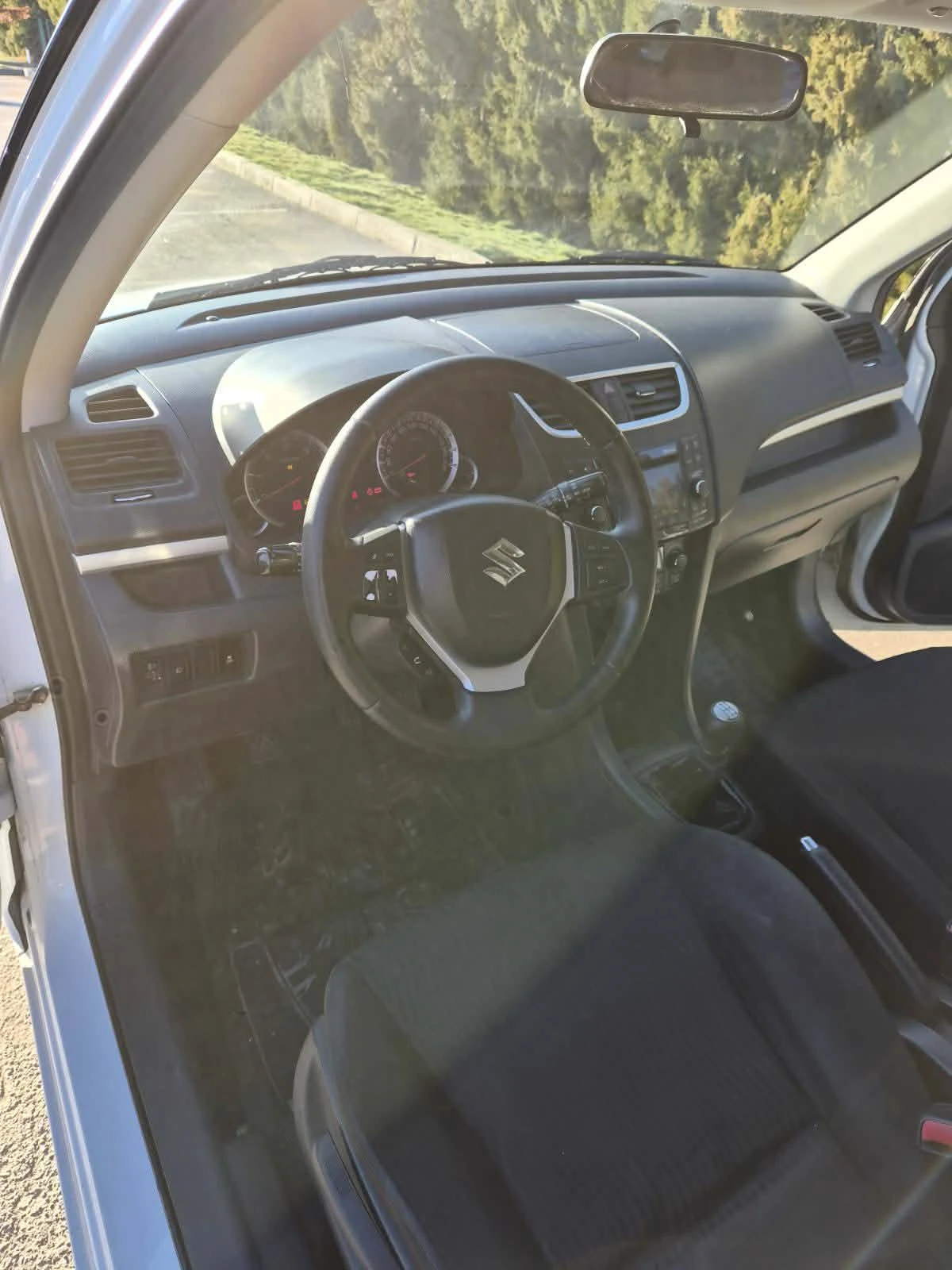 Suzuki Swift 1.3DDIS, снимка 11 - Автомобили и джипове - 53763024