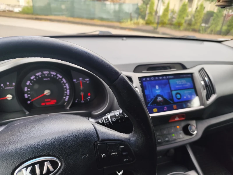 Kia Sportage 2.0crdi, снимка 9 - Автомобили и джипове - 52721510