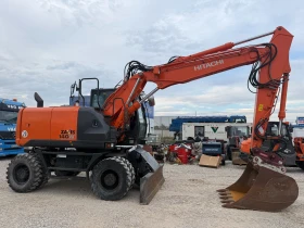 Багер Hitachi ZX 140W-5B, снимка 12