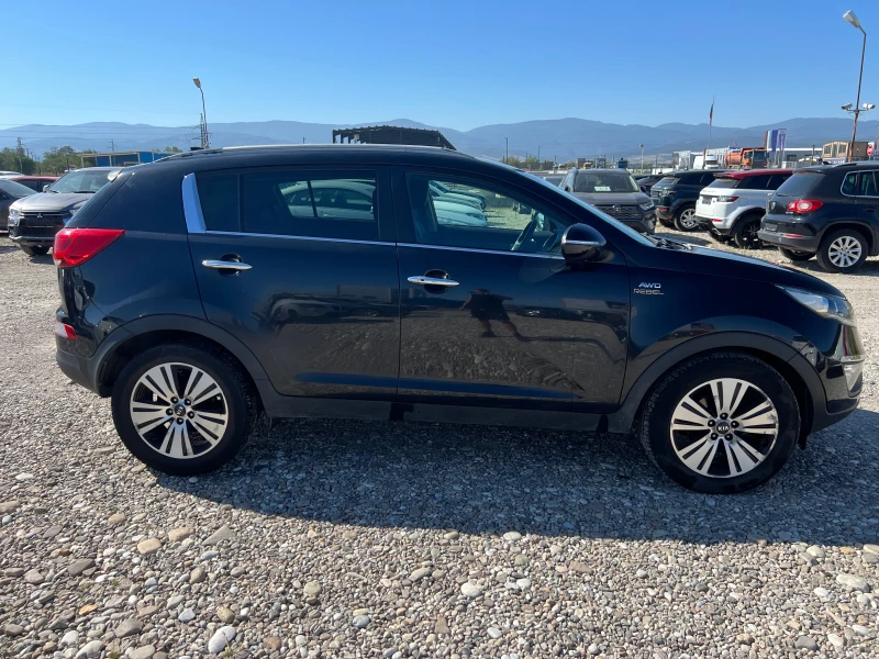 Kia Sportage 2.0 CRDI 4X4 , снимка 4 - Автомобили и джипове - 51532480