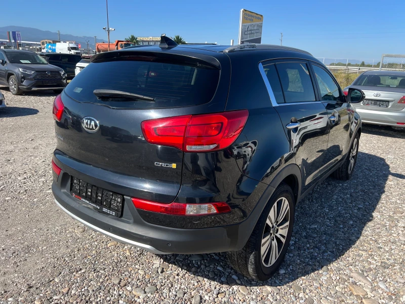 Kia Sportage 2.0 CRDI 4X4 , снимка 5 - Автомобили и джипове - 51532480
