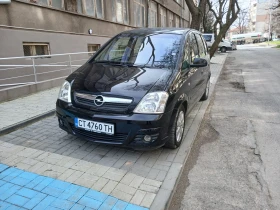 Opel Meriva 1.4 - 2250 € / 4400.62 лв. - 98219628 7