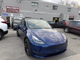 Tesla Model Y Performance / AWD