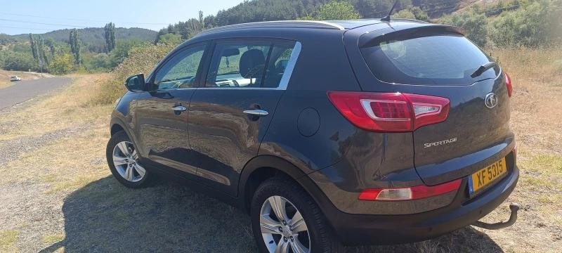 Kia Sportage 2.0бенз.  4х4, снимка 7 - Автомобили и джипове - 47698380