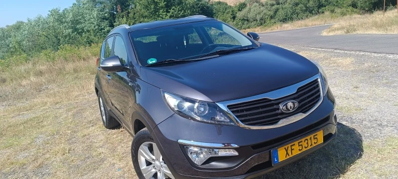 Kia Sportage 2.0бенз.  4х4, снимка 1 - Автомобили и джипове - 47698380