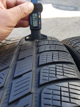 Гуми Зимни 325/35R22, снимка 9