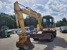 Багер Komatsu PW140