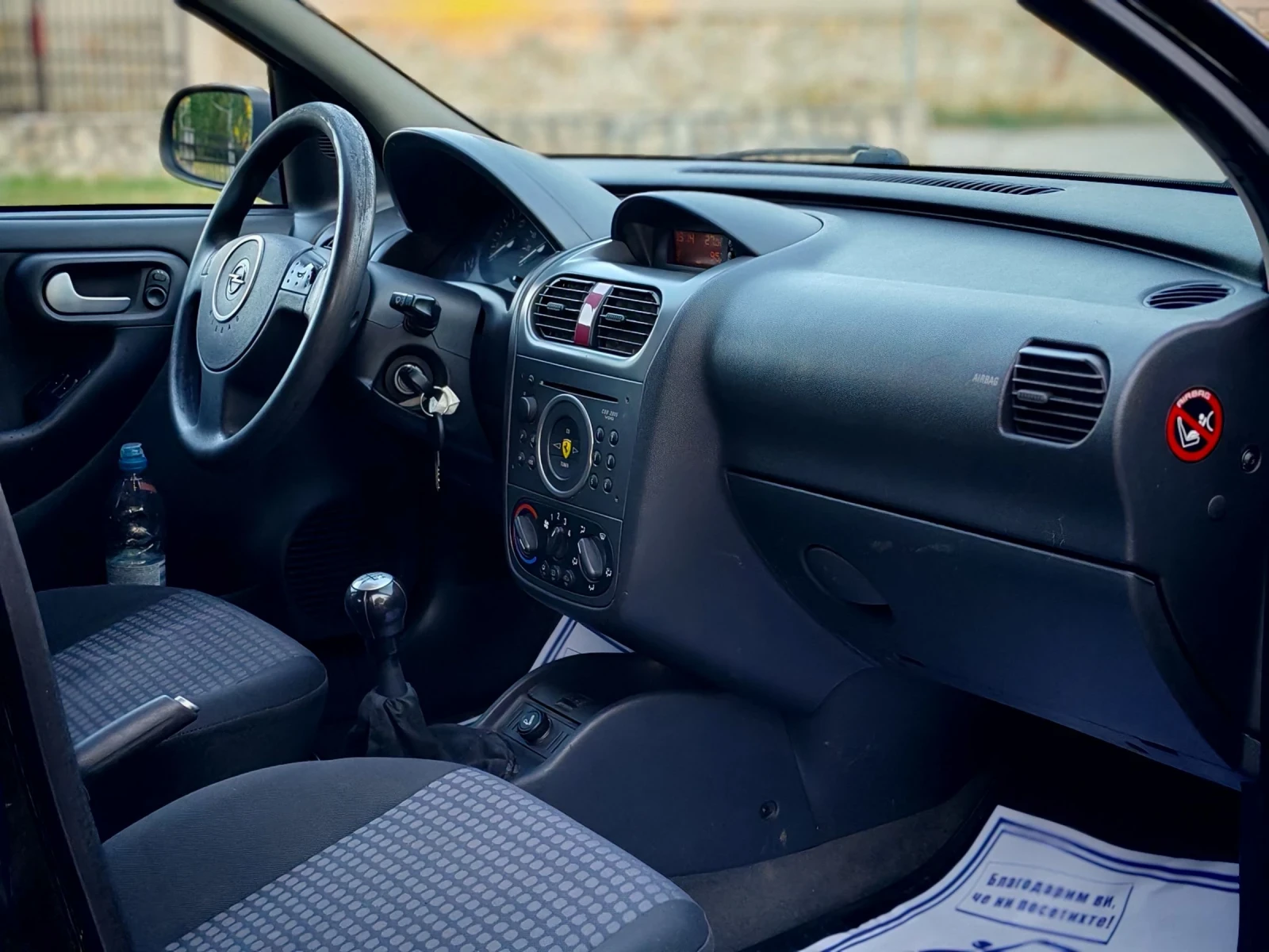 Opel Corsa 1.2I 16V(75)* FACELIFT* КЛИМАТИК* НОВ ВНОС* , снимка 12 - Автомобили и джипове - 55285894