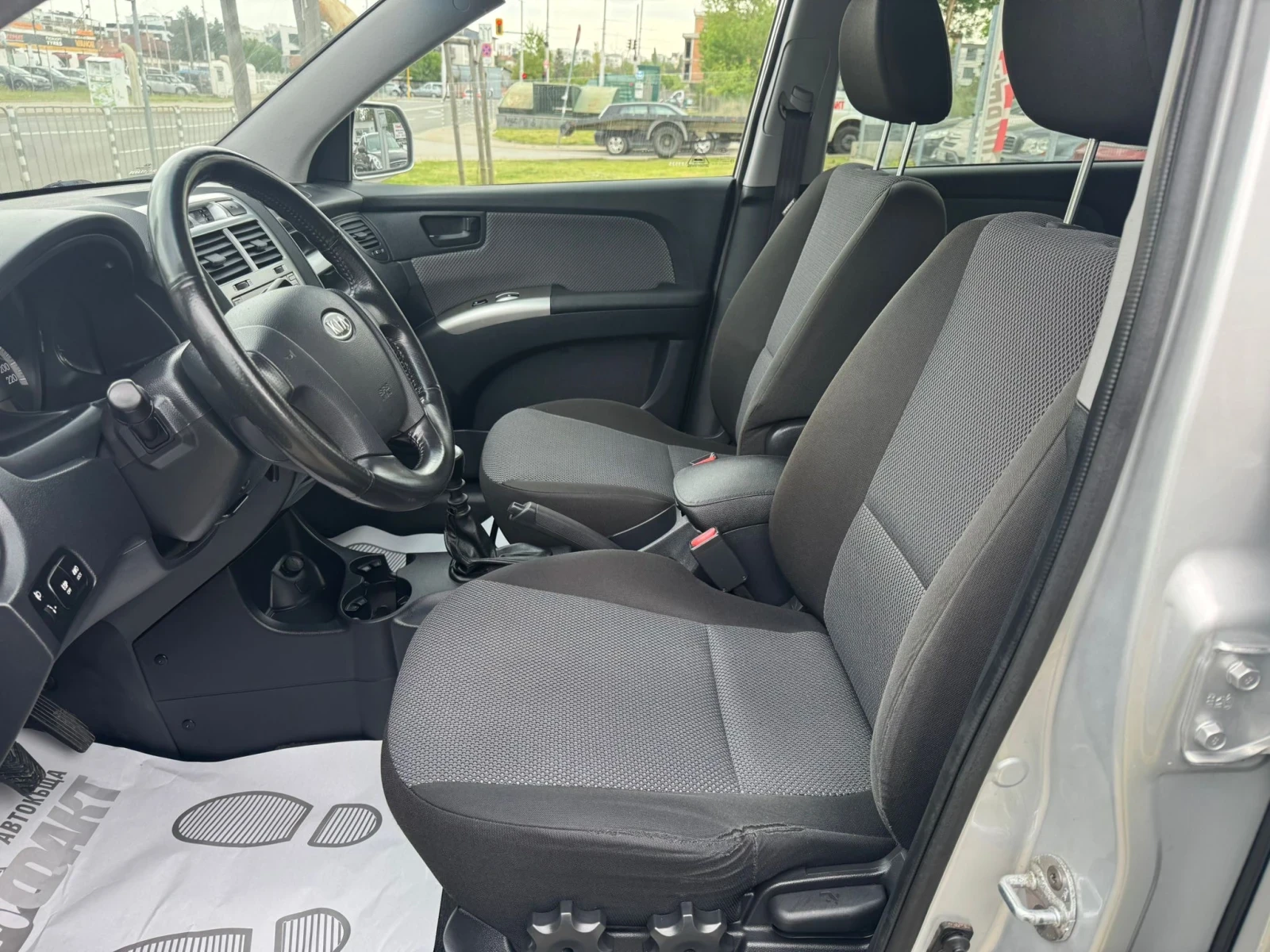 Kia Sportage 2.0CRDi/4x4, снимка 7 - Автомобили и джипове - 54463589