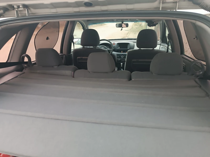 Nissan Almera tino, снимка 11 - Автомобили и джипове - 51913269