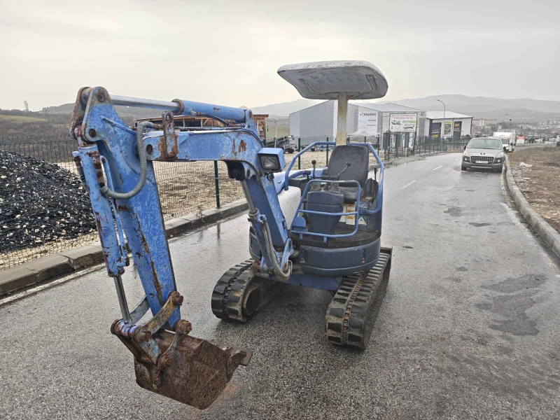 Багер Mitsubishi MM20CR  -2200 kg