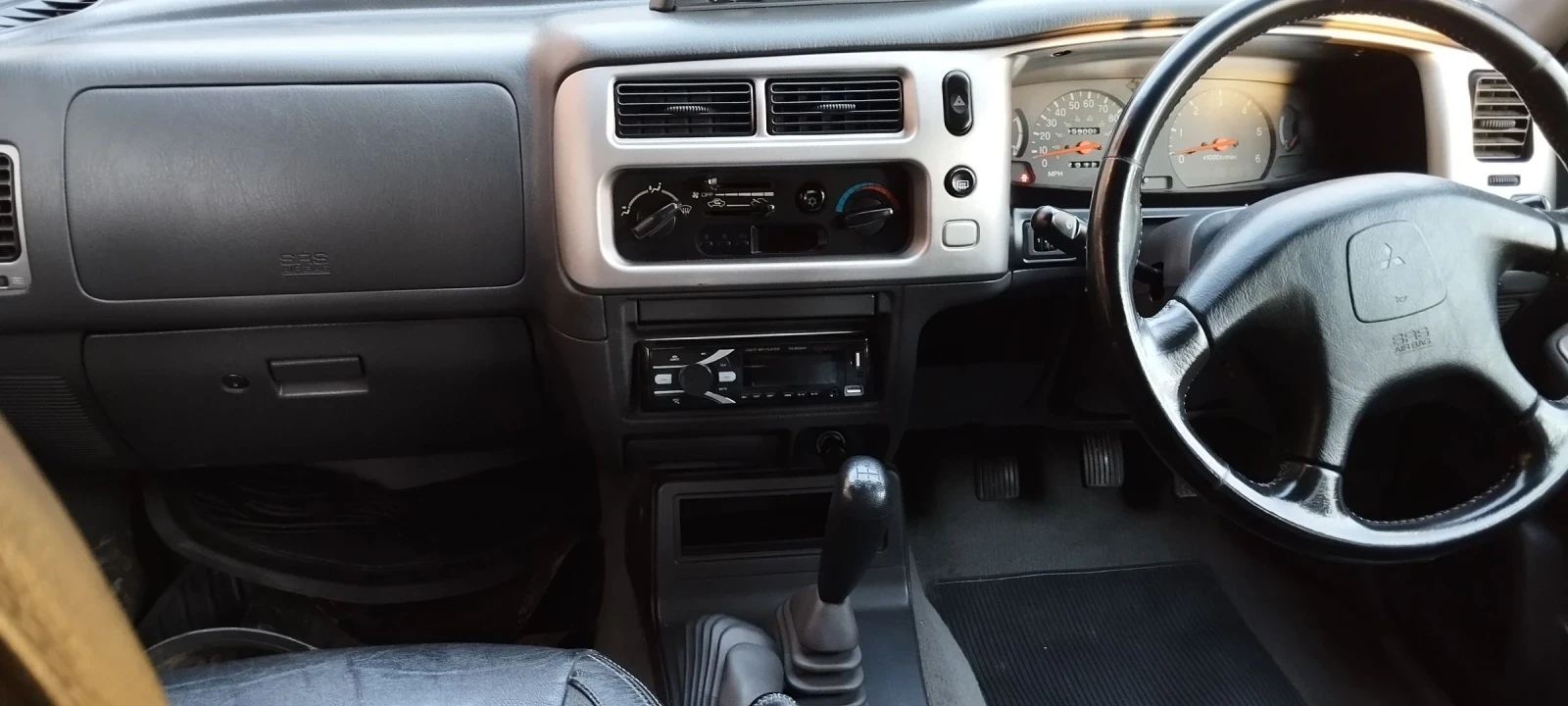 Mitsubishi L200, снимка 12 - Автомобили и джипове - 54722924