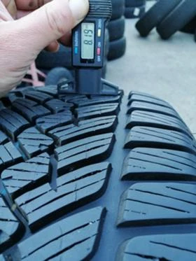 Гуми Зимни 245/45R18, снимка 8