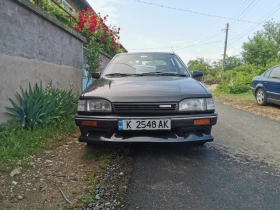 Mazda 323 1.7D, снимка 1