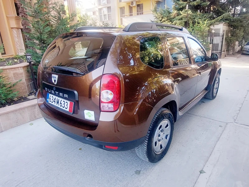 Dacia Duster 1.6 ГАЗ, снимка 11 - Автомобили и джипове - 47319232