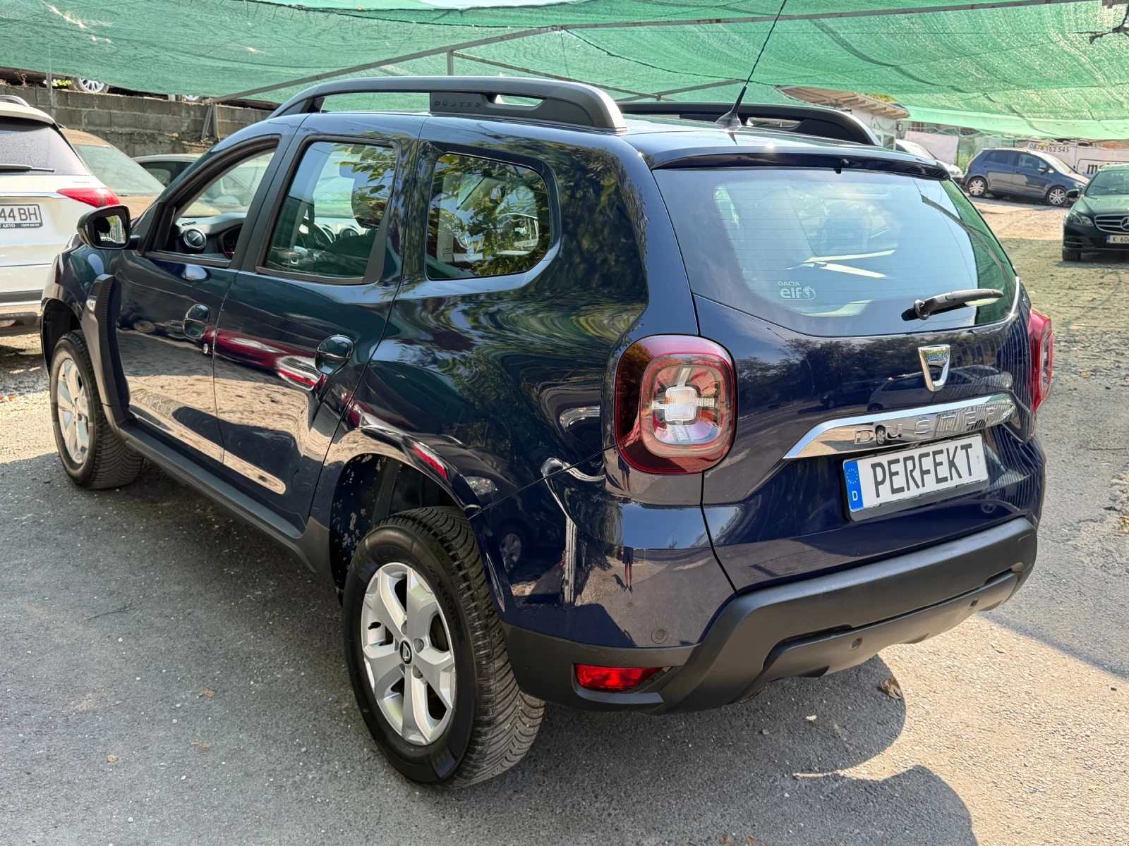 Dacia Duster 1.6i, снимка 6 - Автомобили и джипове - 56124748