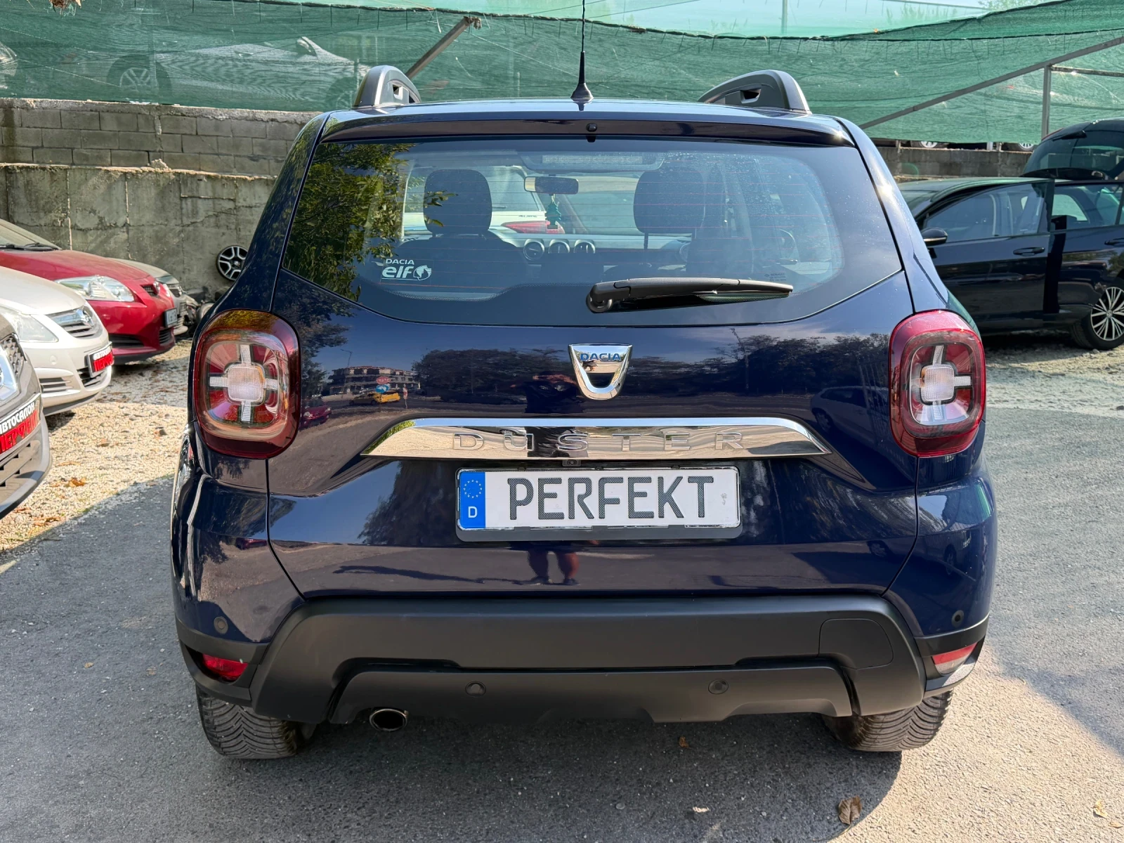 Dacia Duster 1.6i, снимка 5 - Автомобили и джипове - 56124748