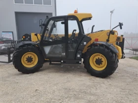 Телескопичен товарач Caterpillar TH407C, снимка 3