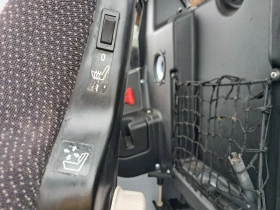 Телескопичен товарач Caterpillar TH407C, снимка 17