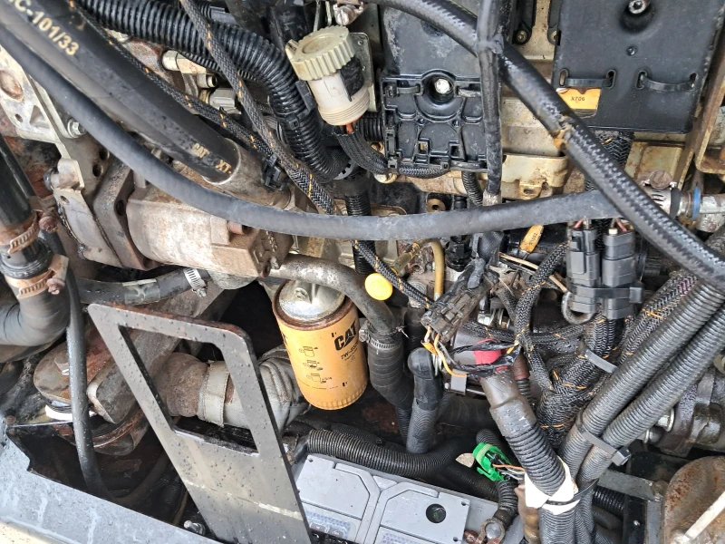 Телескопичен товарач Caterpillar TH407C, снимка 12 - Селскостопанска техника - 52815927