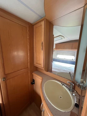 Каравана Hobby 560 KMFE, снимка 10