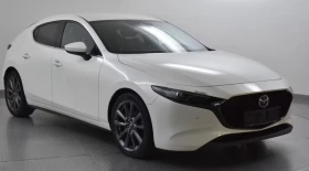 ������ Mazda 3