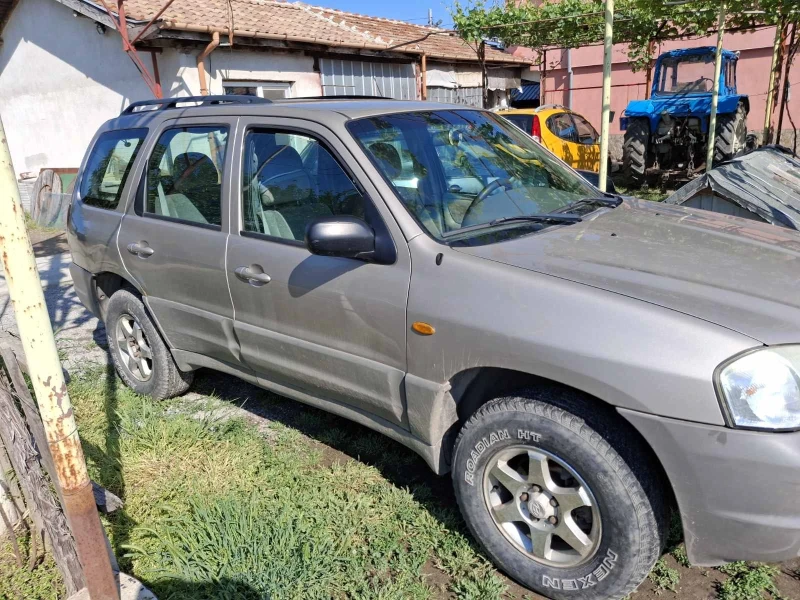Mazda Tribute, снимка 4 - Автомобили и джипове - 53448304