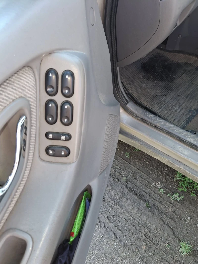 Mazda Tribute, снимка 12 - Автомобили и джипове - 53448304