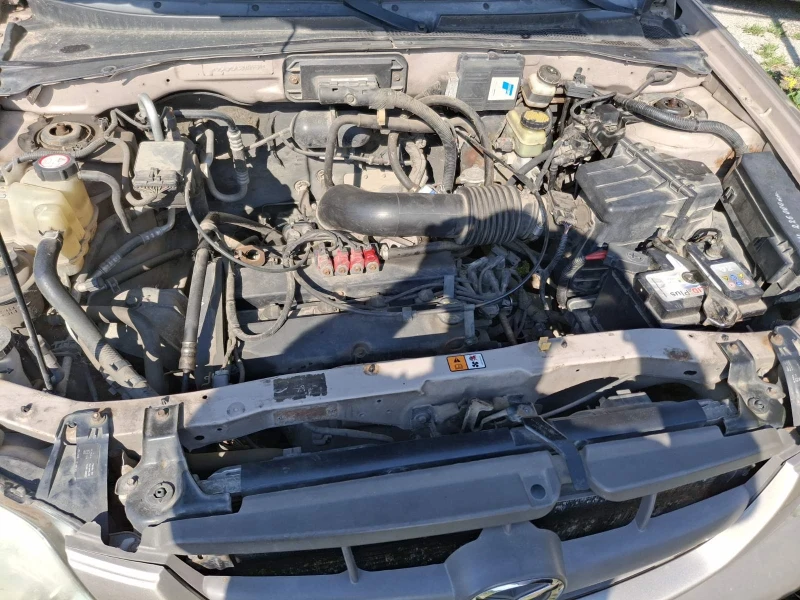 Mazda Tribute, снимка 11 - Автомобили и джипове - 53448304