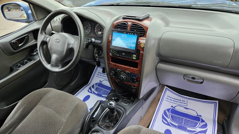 Hyundai Santa fe 2.4 4x4/Klimatik, снимка 11 - Автомобили и джипове - 53208239