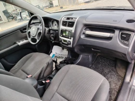 Kia Sportage 2.0i 141кс. /4x4/ ГАЗ/, снимка 11