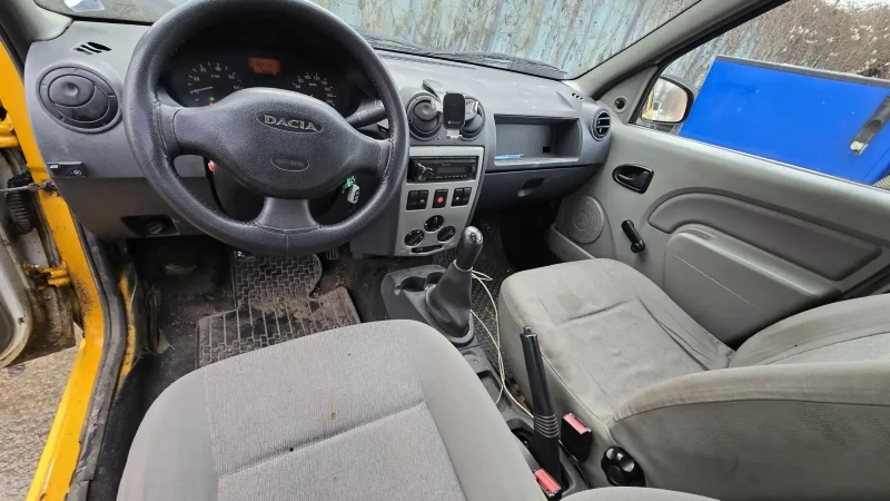 Dacia Logan, снимка 11 - Автомобили и джипове - 48543124