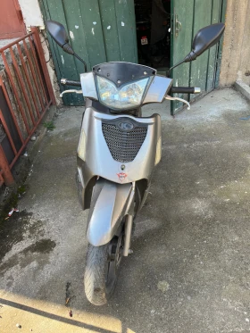     Kymco People S200 i