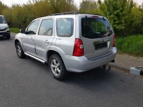 Mazda Tribute 2.3/150-2.0/124 - [5] 