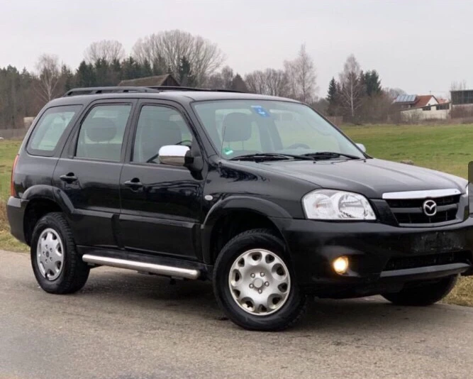 Mazda Tribute 2.3/150-2.0/124 - изображение 3