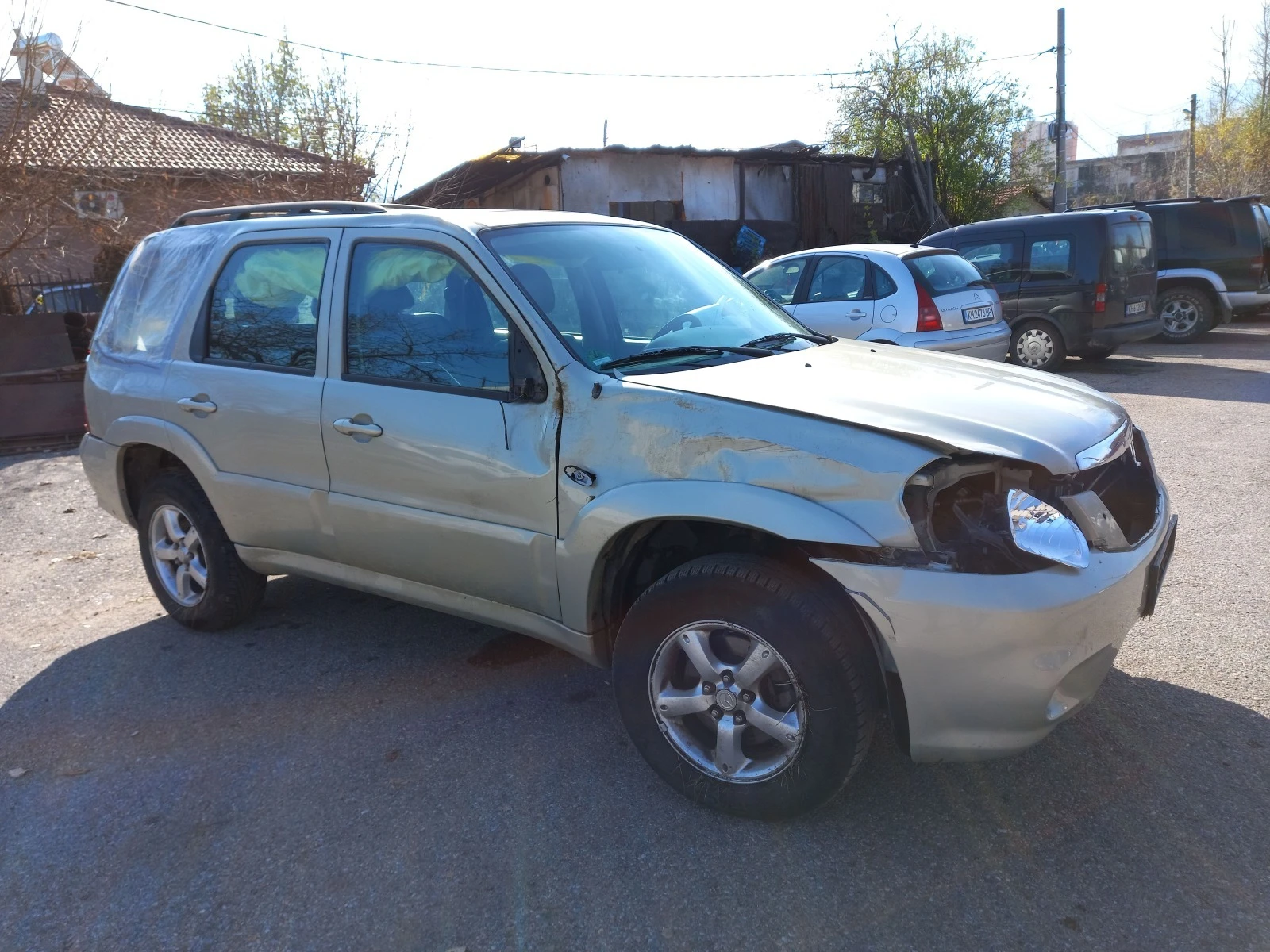 Mazda Tribute 2.3/150-2.0/124 - изображение 7