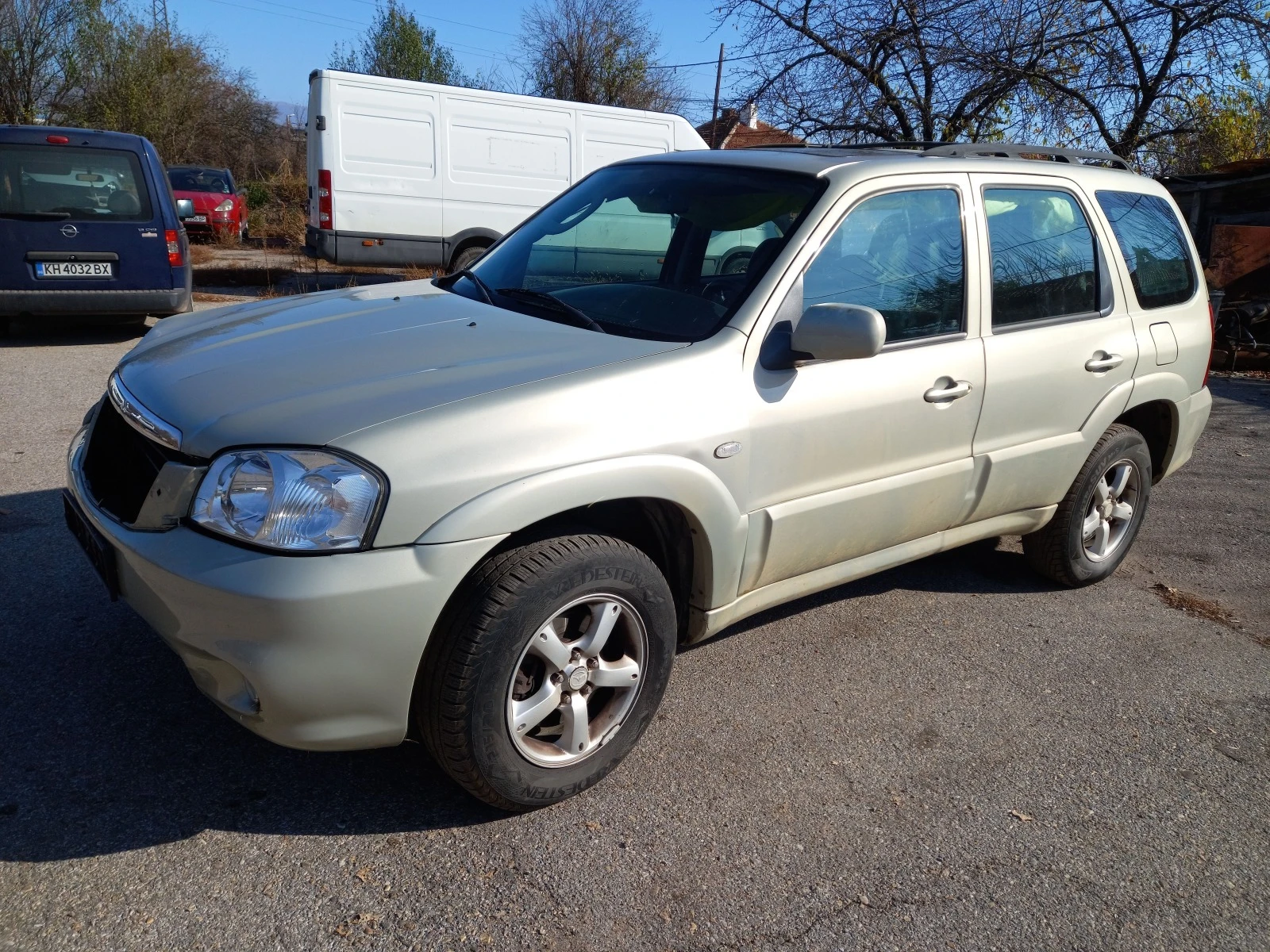 Mazda Tribute 2.3/150-2.0/124 - изображение 6