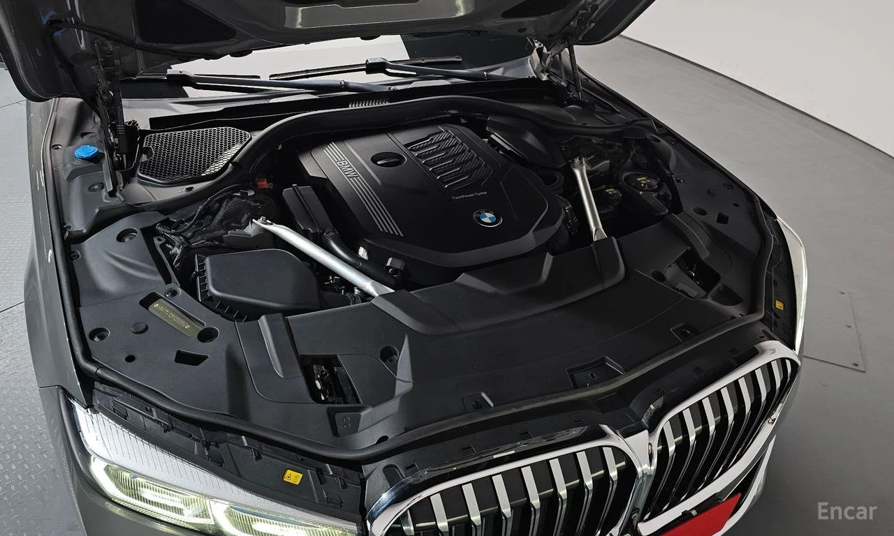BMW 740 ЛАЗЕРИ * ОБДУХВАНЕ * ДИСТРОНИК * H/K * , снимка 10 - Автомобили и джипове - 55187480