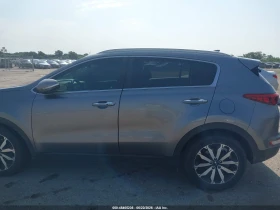 ������ Kia Sportage