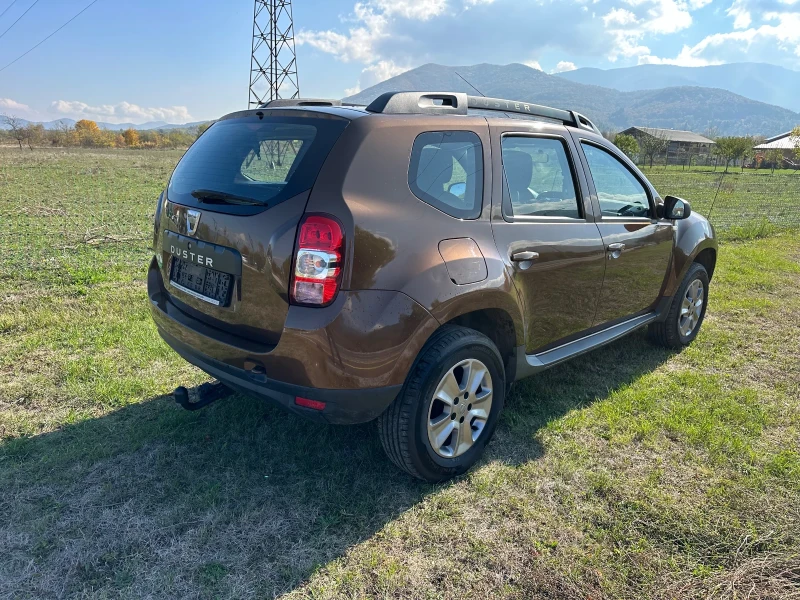 Dacia Duster 1.6 I  Газ/Бензин, снимка 4 - Автомобили и джипове - 52061755